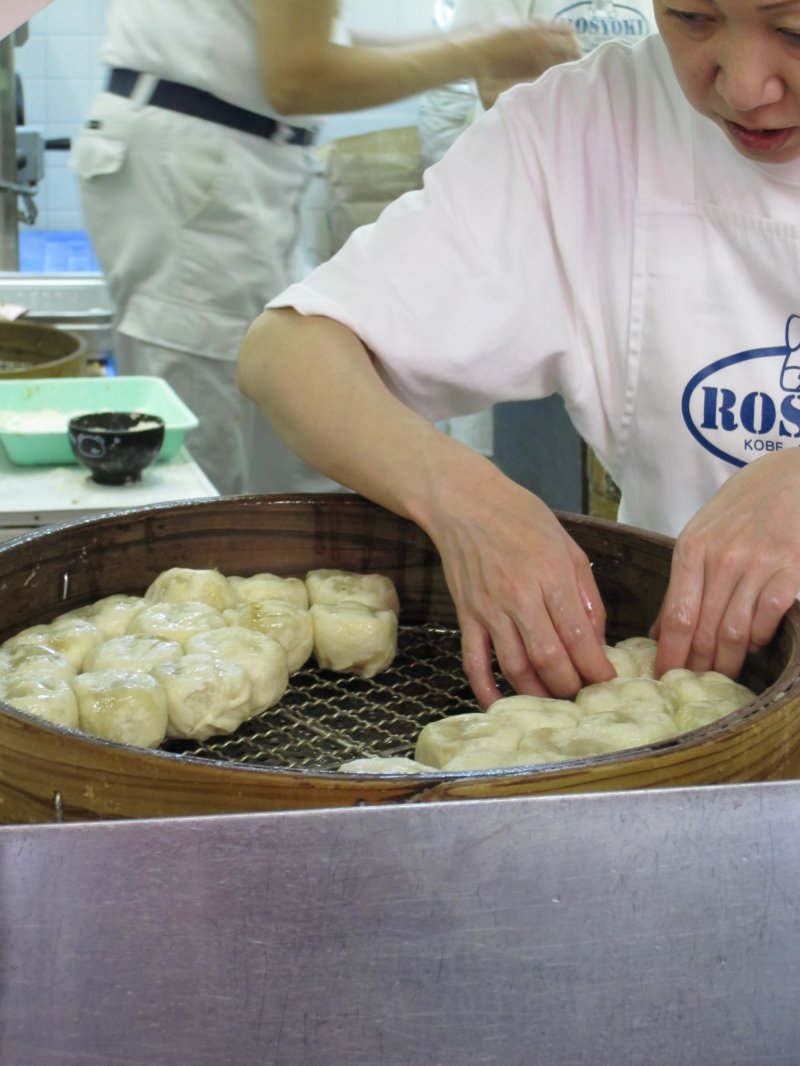 <p>The chefs at work, preparing delcious nikuman (steamed bun with meat filling)</p>