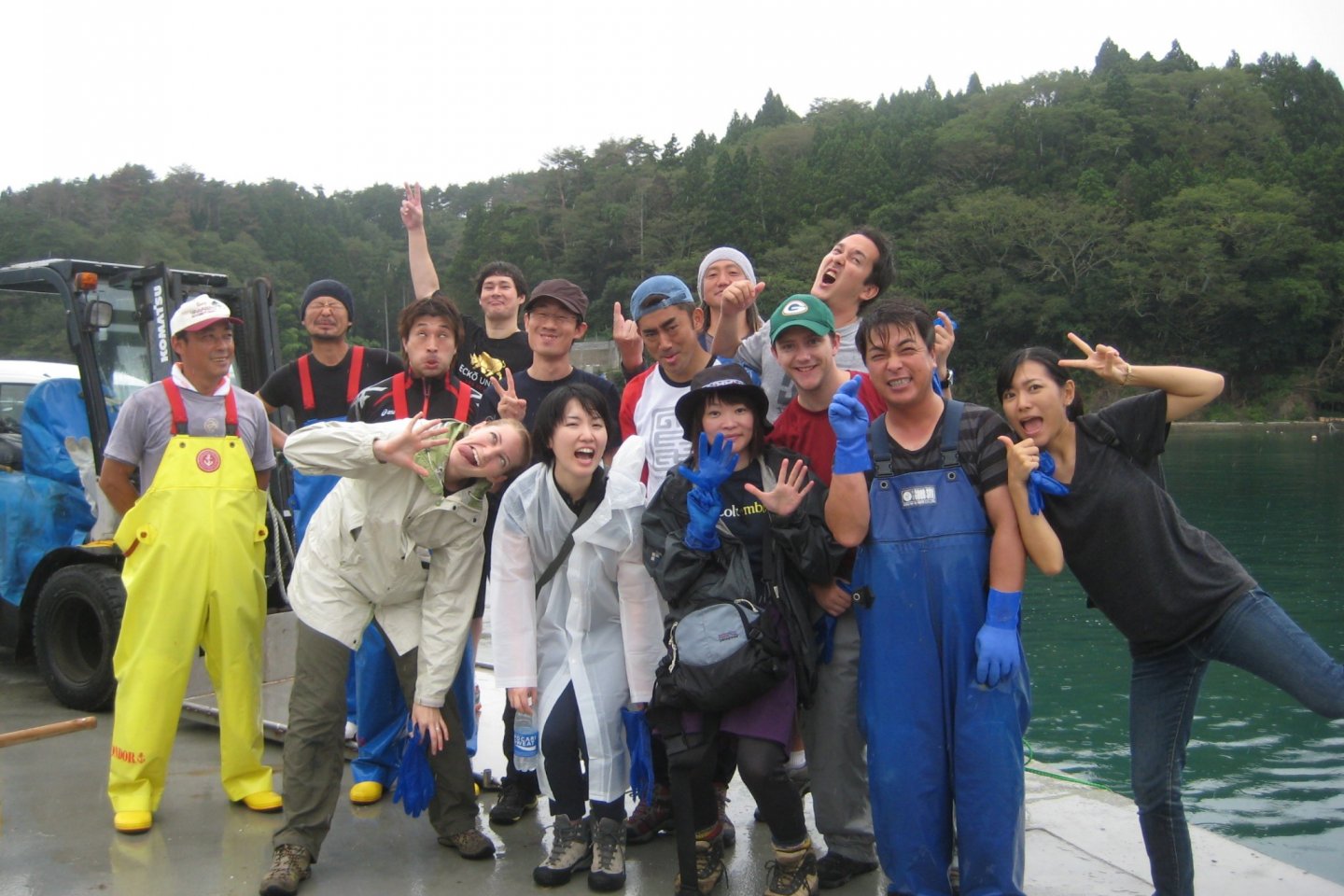 Fished out. Campers rejoice after a successful fishing excursion with local fishermen. 