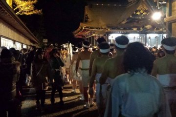 <p>The pilgrims have arrived at Osaki Hachiman Shrine and await a blessing from the priest.&nbsp;</p>
