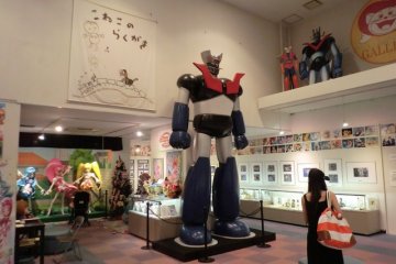 <p>ห้องโถงหลักจัดนิทรรศการ มี หุ่นจำลอง Mazinger Z ขนาดใหญ่</p>