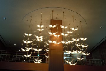 <p>A chandelier that greets everyone as they enter into the theater.</p>