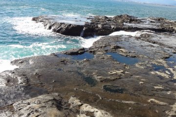<p>There is a wide rocky stretch here, and it is from here that you can see Mt. Fuji (if you are lucky). This rocky beach is called Chigo-ga-fuchi. It suddenly appeared from the sea in 1923, during the Great Kanto Earthquake.</p>